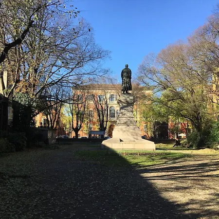 In The Center Of Modena, Piazza Roma And The Ferrari Museum Modena